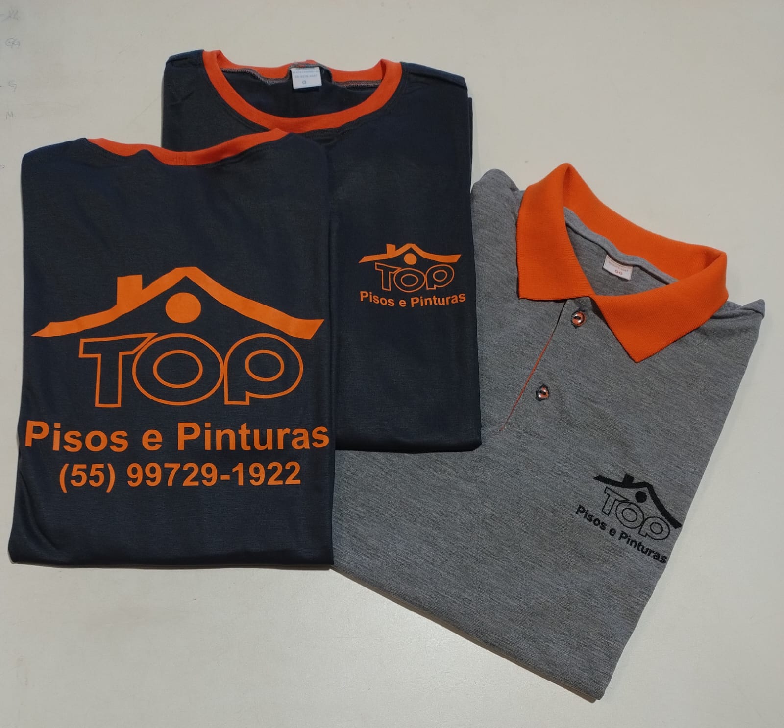 ca,iseta laranja.jpg